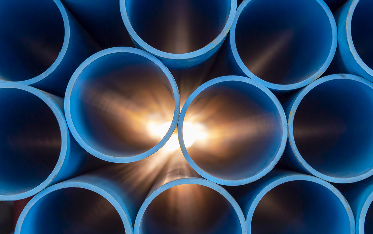 Group of blue water pipes that are stacked into a graphic format.